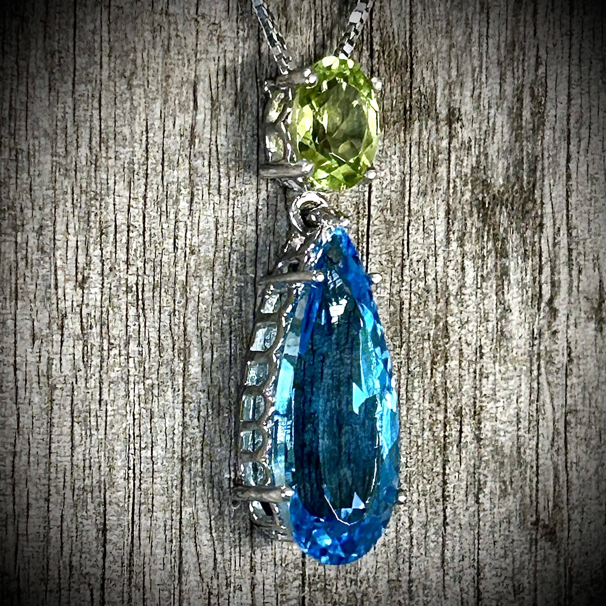 Close-Up Of Vivid Blue Topaz And Bright Green Peridot Gemstones