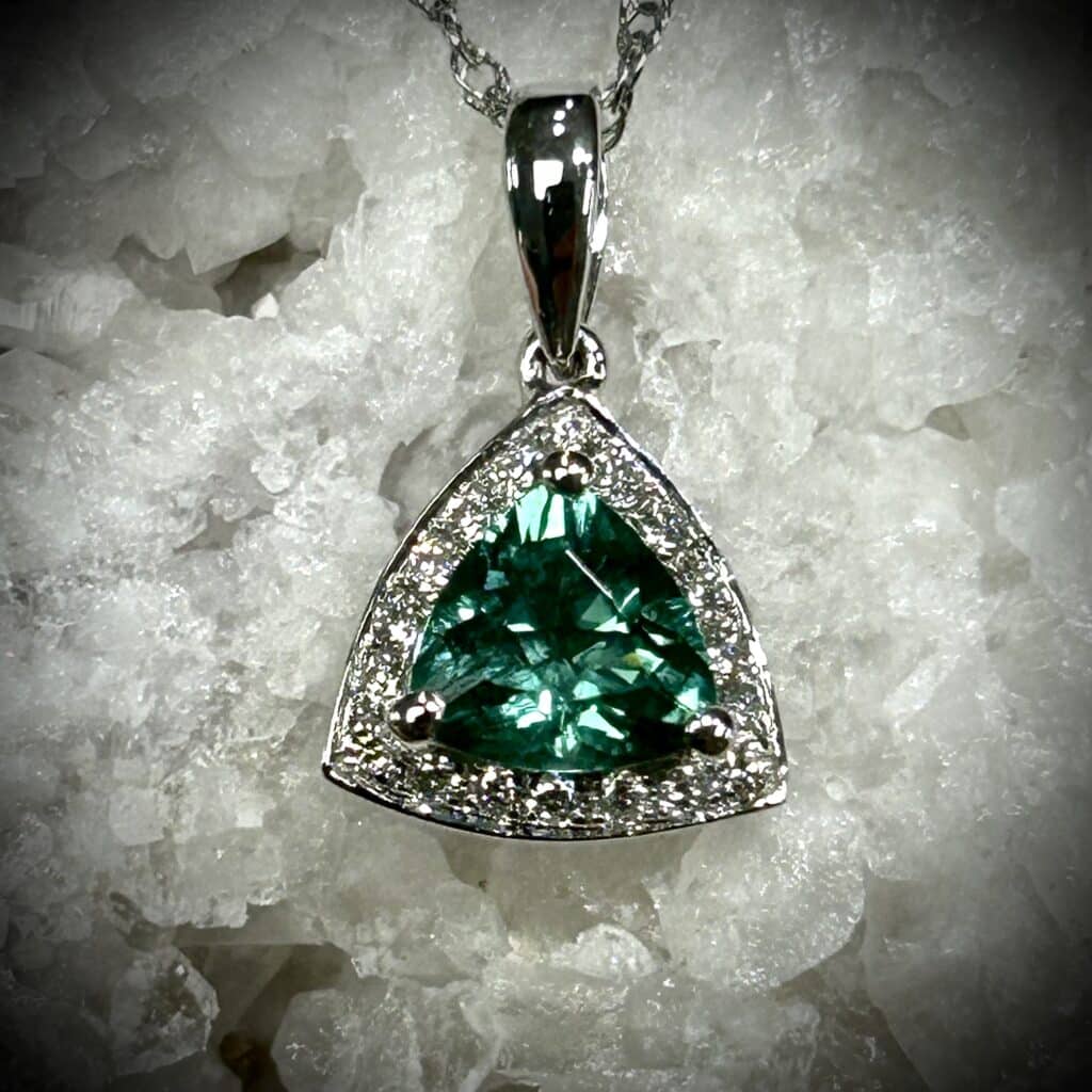 Trillion Cut Blue Green Tourmaline Diamond Pendant Set In 14K White Gold Surrounded By 18 Natural Diamonds