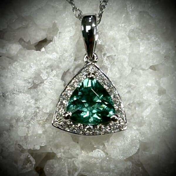 Trillion Cut Blue Green Tourmaline Diamond Pendant Set In 14K White Gold Surrounded By 18 Natural Diamonds