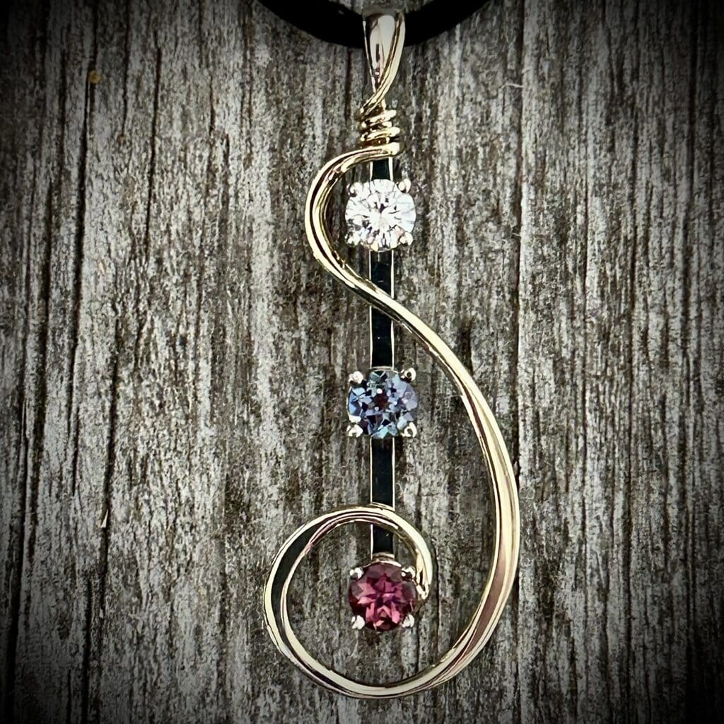 Diamond, Alexandrite And Rhodolite Garnet Pendant Set In 14K White And Yellow Gold. 