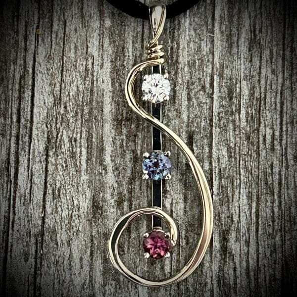 Diamond, Alexandrite And Rhodolite Garnet Pendant Set In 14K White And Yellow Gold. 
