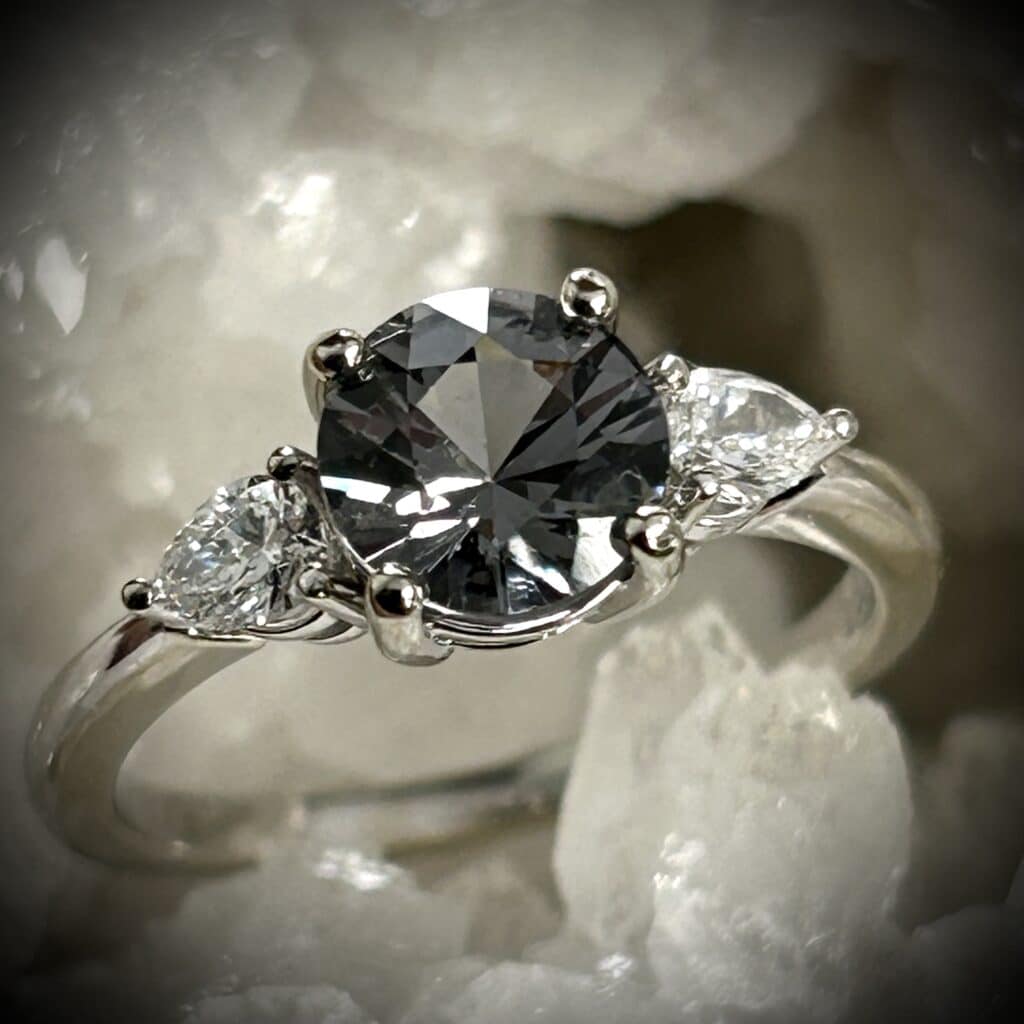 Grey Spinel Diamond Ring With Pear Shape Lab Grown Diamond Accents In White Gold.