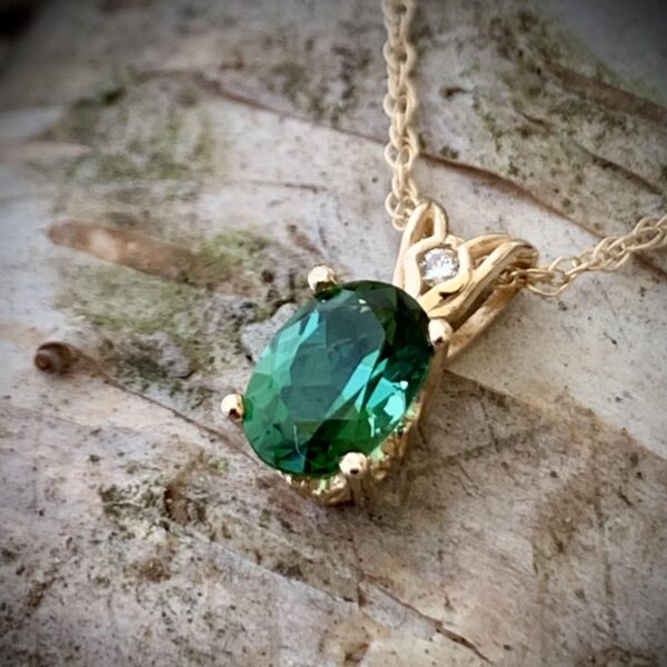 Deep Green Tourmaline Pendant And Diamond Pendant Set In 14K Yellow Gold