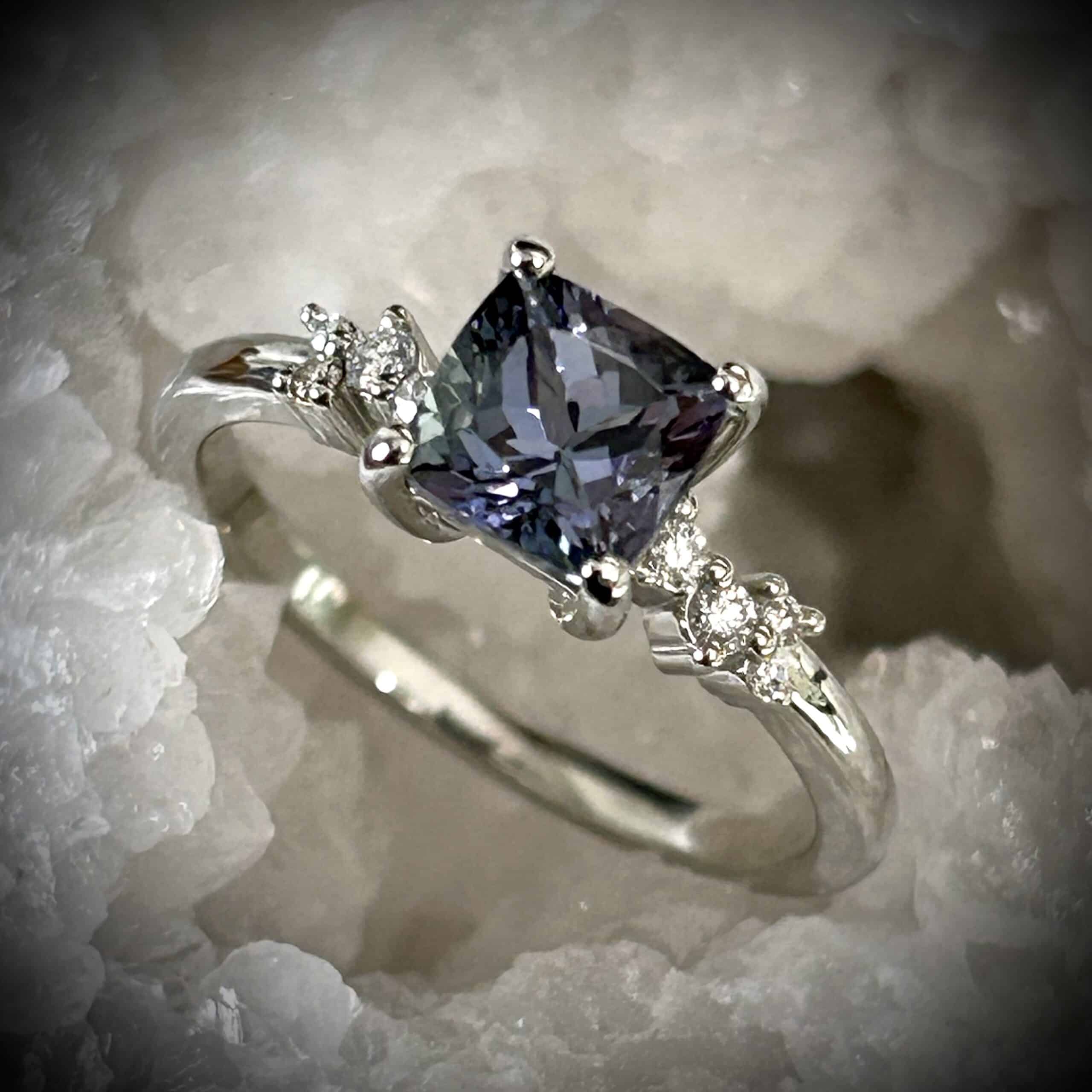 Rare Peacock Tanzanite Gemstone Ring With Diamond Accents And Color-Shift Blues Greens Purples