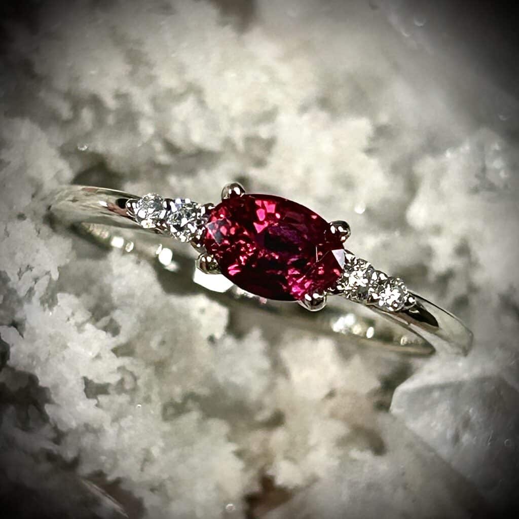 Close-Up Of A Deeply Saturated Natural Ruby Featured In A 14K White Gold Diamond Ring.