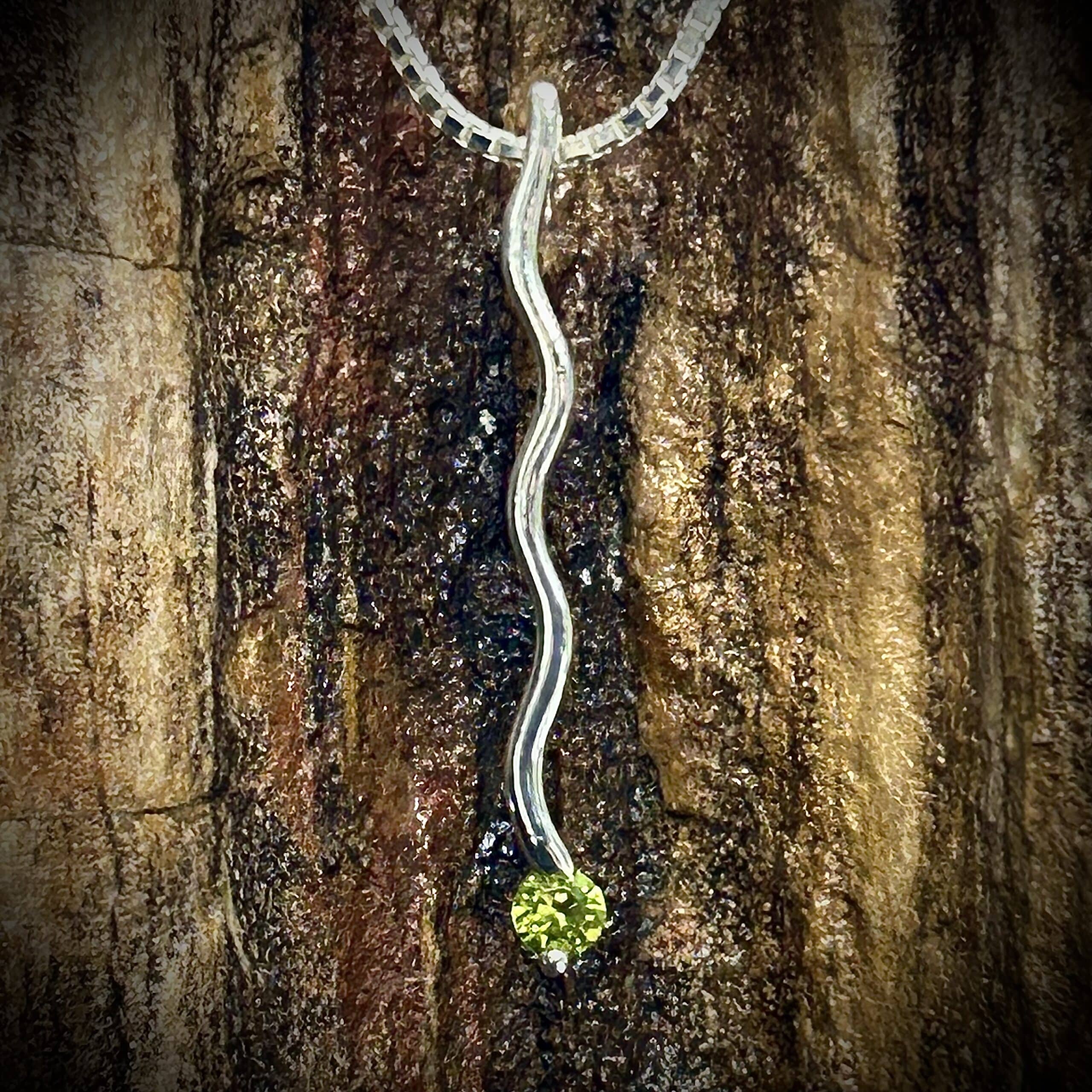 Peridot Gemstone Set In A Small Ripple Wave Pendant In Sterling Silver By River'S Edge Gems