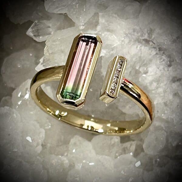 A Rare Watermelon Tourmaline With Diamonds Showcased In An Open-Ended Ring Design.